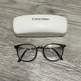 47-18-140 Calvin Klein Ck20704 Crystal Charcoal Womens Round Frames Only Case