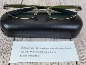 22-174 Oakley Evade Titanium Brushed Chrome Rimless Eyeglasses Frames 53-18 133