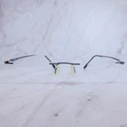 Nikon NC04 Titanium Rimless Eyeglasses Gunmetal Grey Frames 140MM 0804 Pre-owned. Price: $23.99.