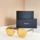 Prada Sunglasses Round Metal Frame Model: 56ZS Size: 54-20-140 New. Price: $158.10.