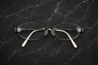 $1,500 Chopard "miami Sunset" Pure Rimless Eyeglass Frames, 12K Gold Filled!! New. Price: $200.00.