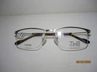 New Tlg Thin Light Glasses NU040 C01 Matt Gold Color Titanium Rimless 55-18-145. Price: $45.00.