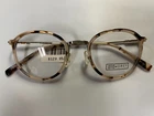Otis+grey Og 202125 Tokyo Tort 48-21-140 Round Frames With Factory Demo Lenses New. Price: $20.00.