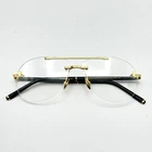 Tom Ford Eyeglasses Frames Private TF6147-P 030 Horn And Titanium Opticals 57MM New. Price: $1188.88.