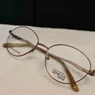 Eyeglass Frames Catherine Deneuve CD0403 Copper Tone 046 54-17-135 New. Price: $40.00.