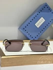Gucci Classic Frameless Sunglasses Brown Lenses GG221S/56-16-140 New. Price: $169.00.