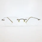 Silver Dollar Optical Beta Titanium Rimless Eyeglasses Color #2 Gunmetal 34187 Pre-owned. Price: $31.99.