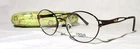 Focus Eyewear By I-dealoptics Model 77 New 54-16-135 Coffee Metal Eyeglass Frame. Price: $39.99.