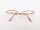 Kay Unger Eyeglasses, Frames Only, K232 Gld, 55-17-140, Metal/plastic, Gold/pink Pre-owned. Price: $39.99.