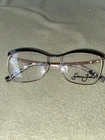 Sean John 6016 001 Shiny Gold Black Enamel Eyeglass Frames 56 17 140 (A32) New. Price: $14.95.