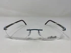 Silhouette Austria 4546 40 6064 4548 53-17-130 Blue/brown Eyeglasses Frame 5874 New. Price: $160.00.