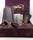 New Giorgio Armani Titanium Sunglasses 6018-T-K 3071/7C Gold Frame Green Lens. Price: $599.95.