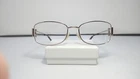 Kirkland Signature Ava 394543 Gold/brown 55-17-135 Italy Made 422 Pre-owned. Price: $20.00.