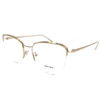 Prada Eyeglasses Frames Vpr 60U 5AK-1O1 Shiny Gold Cat Half Rim 53-19-140 New. Price: $199.99.