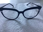 Modo Eyeglass Frame Titanium Model 4547 Black 51/17/142 &H99 New. Price: $59.95.