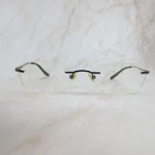 Rims Eyewear R3 1009 Eyeglasses Frame Women's Gunmetal Rimless Oval 50-17-135 Pre-owned. Price: $25.59.