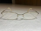 Charmant CH8283 Pure Titanium 135MM Glasses Frames Pre-owned. Price: $15.00.