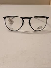 Oakley Money Clip Frames Only OX5145-0152 Black Clear Lens 52-20-141 New W/tags. Price: $157.00.
