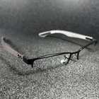 Ban Eyeglasses RB8412 2503 Matte Black 54-17-145 Gray Carbon Fiber Half Rim New. Price: $97.99.