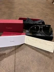 Cartier Women's Sunglasses Model CT0110S 004 CAT.2 Silver Frame New. Price: $500.50.