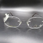 Naturally Rimless Nr 343 Gunmetal Oval Eyeglass Frames 50-19-135 Demo New. Price: $30.60.