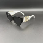Dolce & Gabbana Logo Cat Eye Sunglasses Black White Gold DG4387 087/56 Pre-owned. Price: $79.99.