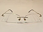 Tiffany & Co. Tf 1110-H-B 6021 Designer Eyeglasses Gold 53-16-135 Rimless, Pearl Pre-owned. Price: $109.95.