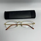Cartier T8100608 Pale Gold 51MM Titanium Oval Half Rim Unisex Vintage Eyeglasses Pre-owned. Price: $297.00.