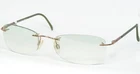 Etienne Aigner EA470 68 Gold /copper Tan Eyeglasses Rimless 57-21-125MM New. Price: $54.00.