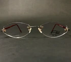 Flair Eyeglasses Frames Jet Set 709 COL.711 Red Gold Oval Rimless 54-18-135 New. Price: $96.03.