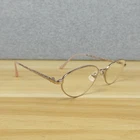 Vintage Seiko Eyeglasses Frames T-051 Titanium Gold/pink 51-18-135 Japan Pre-owned. Price: $42.75.