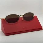 Fendi FE4075US Rimless Oval Sunglasses Women Gold Frame Gray Gradient Lenses New. Price: $179.90.