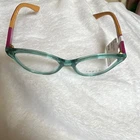 Vogue Eyeglasses VO3940 965-S 52-16-140 Purple Half Rim Frame New. Price: $25.00.