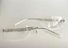Calvin Klein CK947 530 Silver Tone Rimless Eyeglass Frame Broken Demo Lens New. Price: $44.99.