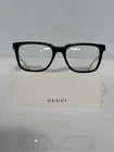 Gucci GG0560ON 005 Black Acetate Clear Gold Temples Eyeglasses 55MM New. Price: $280.00.