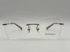 Tiffany & Co. Tf 1150 6021 Pale Gold Metal Rimless Eyeglasses 55MM - New. Price: $215.00.
