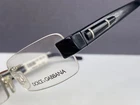 Dolce Gabbana Eyeglasses Frames Woman Black Silver Square Rimless 1153 NP:254 New. Price: $95.09.