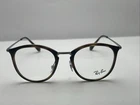 Ray-ban RB7149 2012 49:20 159 Round Brown Eye Frames 2981 New. Price: $119.00.