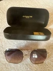 Coach Shiny Light Gold 90050J, 58/18/140 New. Price: $75.00.