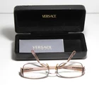 Versace 1062-B Vintage Eyeglasses Frame Pink Crystal W/ Case & Authenticity Card Pre-owned. Price: $69.99.
