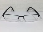 Ovvo Optics Women Mod 2299 Black Titanium Eyeglass Frames CT1-146 New. Price: $249.99.