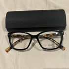 Prada Women's Eyeglasses Frame New In Box. Price: $299.00.
