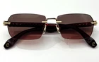 Christian Louboutin Sunglasses Greggo LB0041 32C Gold Rimless Frame 56-16-145 New. Price: $428.88.