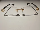 New Gucci GG1221O 001 Men's Rimless Eyeglasses - Gold/black. Price: $289.99.