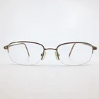 Technolite Flex Tlf 523 Bronze Semi Rimless Rectangular Eyeglasses 52-19-140 Pre-owned. Price: $67.98.