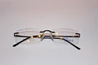 New Optic World OW003 Eyeglass Frames 53-18-137 Off Black Clear For Rx. Price: $9.75.
