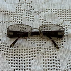 Versace MOD1163-B 1333 52016 130 Bronze Metal Frames With Brown Plastic Temples Pre-owned. Price: $71.88.