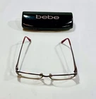 Bebe Ambitious BB5014 Eyeglass Frames Only 52-16-135 Smoked Topaz W/case Pre-owned. Price: $29.00.