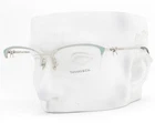 Tiffany Eyeglasses Tf 1102 6047 Shiny Silver Blue Shimmer 55MM W/pouch New. Price: $215.00.