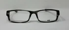 Oakley OX1066-0255 Grey Tortoise Servo Eyeglasses. Size 55-18-140 New. Price: $123.00.